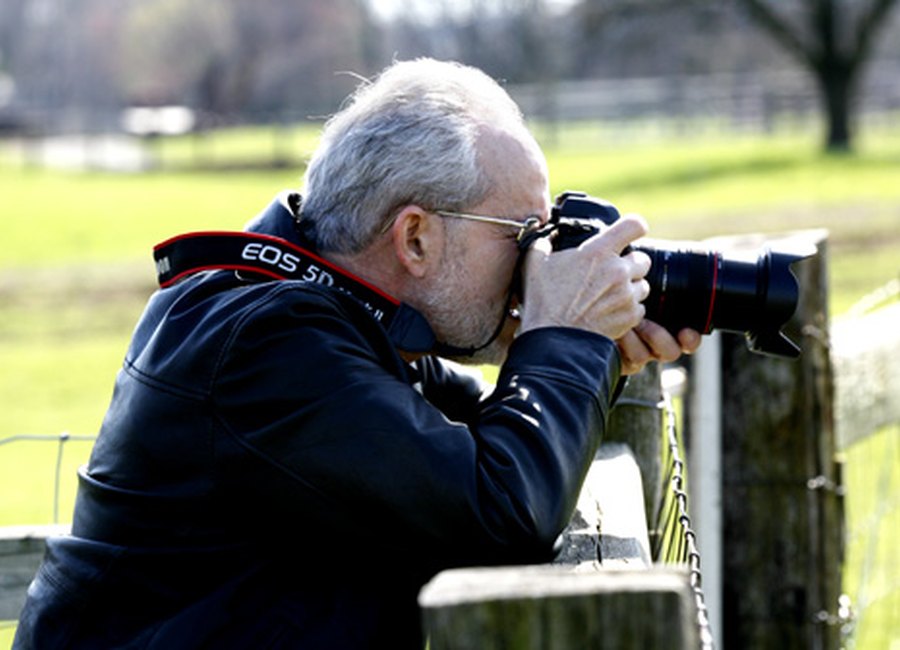 Photographer working with camera
